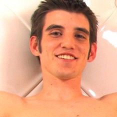Brunette and skinny twink wanking it off